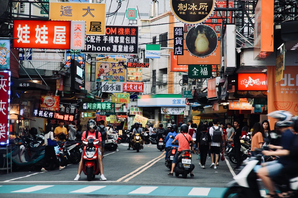 People on motorcycles in the streets of Taiwan