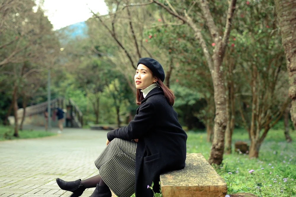 Girl sitting on a bench